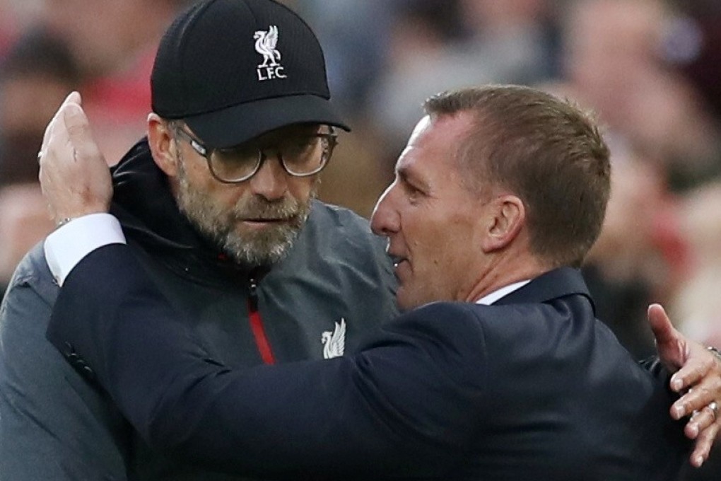 Liverpool manager Jurgen Klopp and Leicester City counterpart Brendan Rodgers embrace after a Premier League match last October. Photo: Reuters