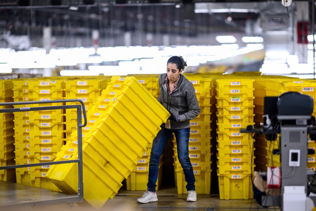 A woman works at Amazon’s Staten Island warehouse in New York. File photo: AFP