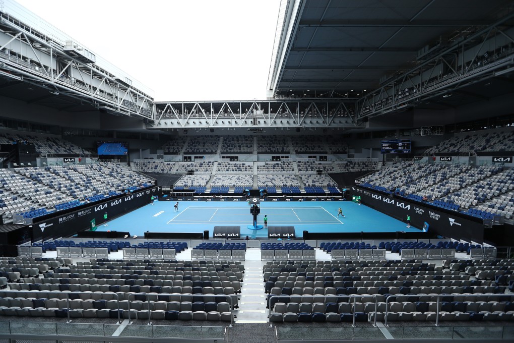 Jessica Pegula of the US (right) hits a return to France’s Kristina Mladenovic in front of empty stands during their third round match at the Australian Open. Photo: EPA