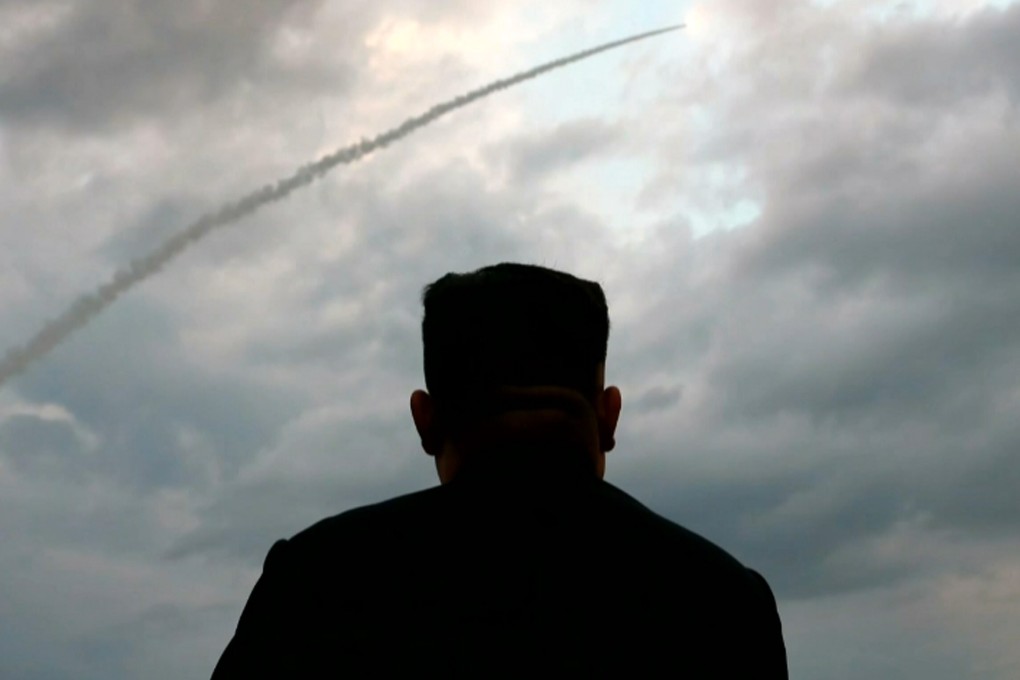 North Korean leader Kim Jong-un watches a ballistic missile launch at an unknown location in 2019. Photo: AFP