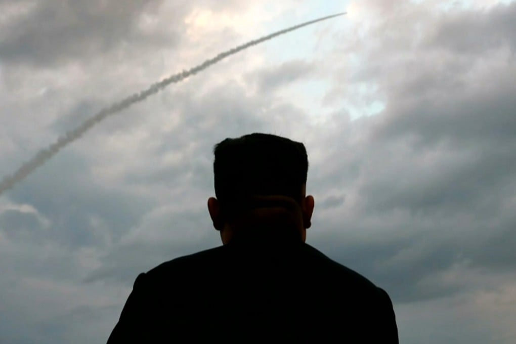 North Korean leader Kim Jong-un watches a ballistic missile launch at an unknown location in 2019. Photo: AFP