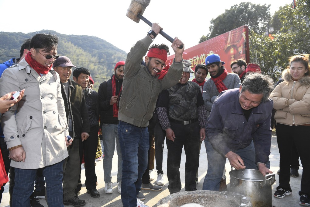 An Indian student in China’s Zhejiang province enjoying Lunar New Year festivities. Photo: Xinhua