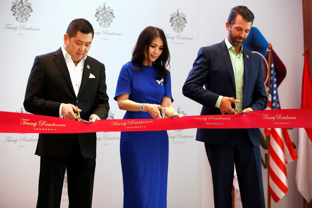 Hary Tanoesoedibjo, left, and his wife, Liliana Tanaja Tanoesoedibjo, cut the ribbon on the Trump Residences in Jakarta with Trump Organization Vice-President Donald J. Trump Jnr in Jakarta, Indonesia, in August 2019. Photo: Reuters
