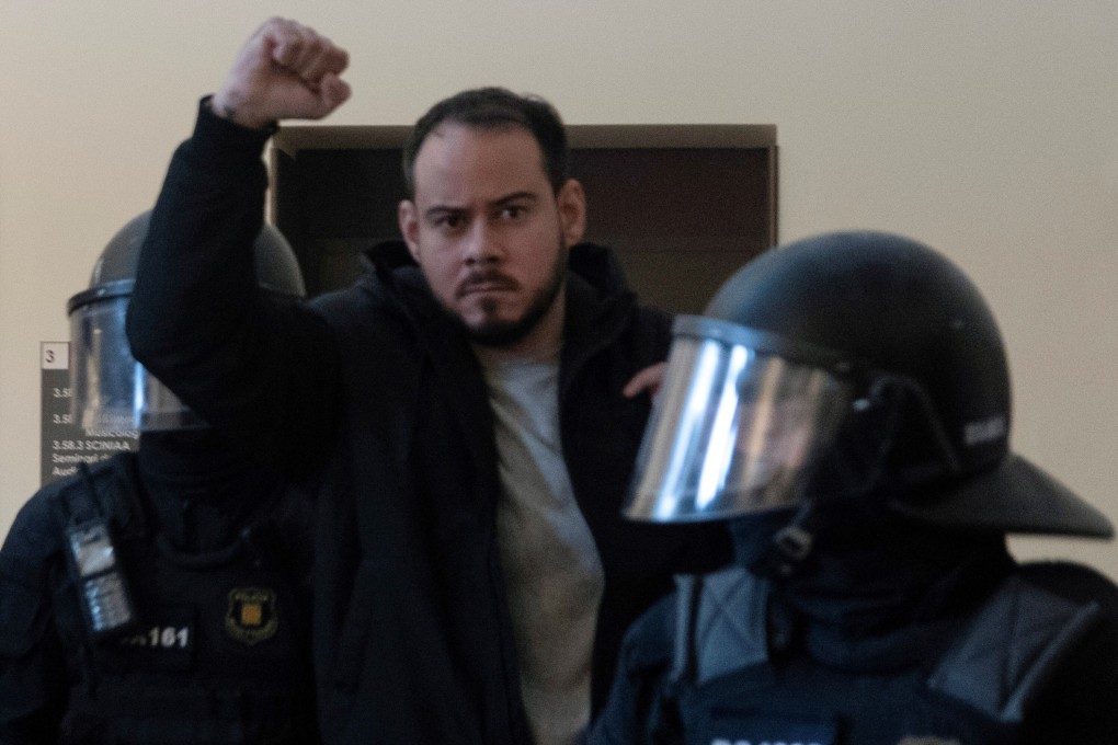Spanish rapper Pablo Hasel after he was detained by riot police inside the University of Lleida. Photo: Reuters