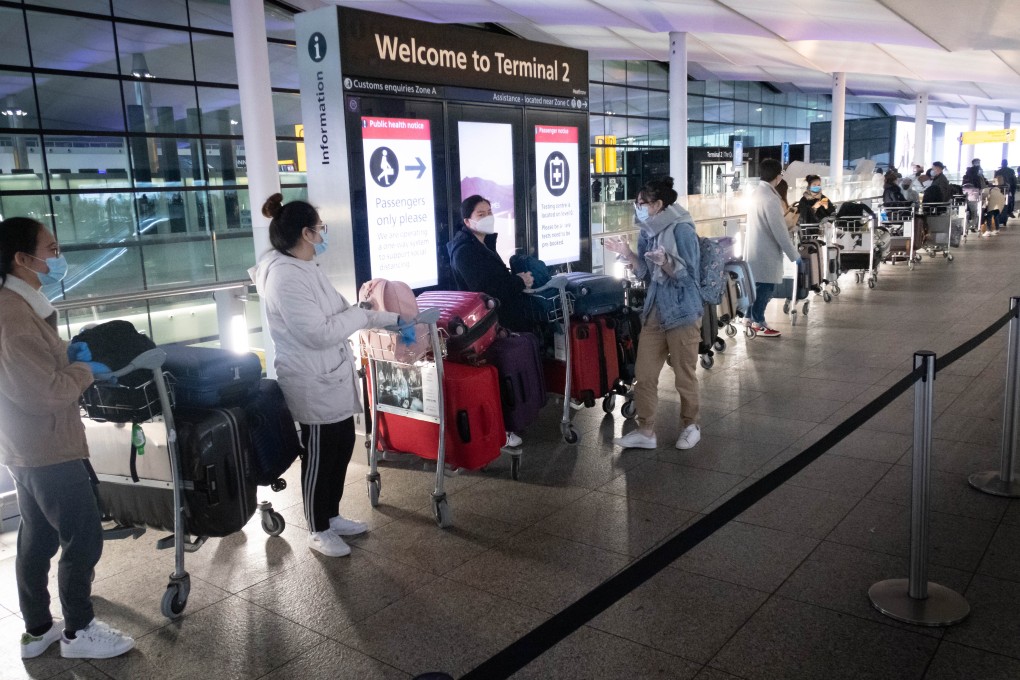Passengers queue to enter the departures area at Heathrow Airport in London last December. Photo: Xinhua