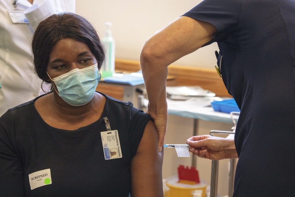 A health care worker receives the Johnson & Johnson Covid-19 vaccine in Cape Town, South Africa, on February 17. The vaccine has been approved by South African Health Products Authority and is expected to only be given to health care workers. Photo: EPA-EFE