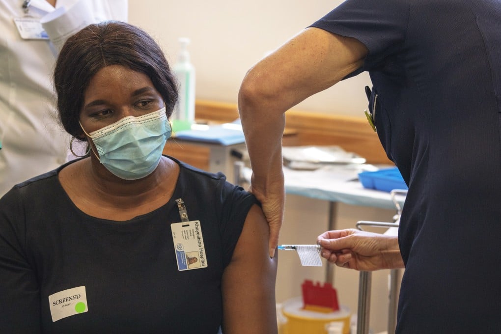 A health care worker receives the Johnson & Johnson Covid-19 vaccine in Cape Town, South Africa, on February 17. The vaccine has been approved by South African Health Products Authority and is expected to only be given to health care workers. Photo: EPA-EFE