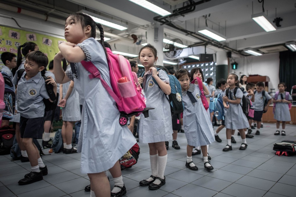Schools need to teach about the policy tools and technological means to reduce carbon emissions, and become directly engaged in carbon reduction efforts themselves, with students sitting on committees steering these changes. Photo: AFP