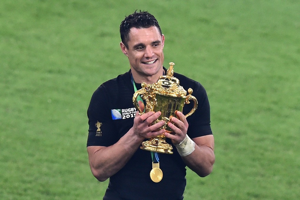 Dan Carter holds the Webb Ellis Cup after New Zealand beat Australia in the 2015 World Cup final. Photo: AFP