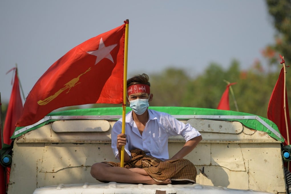 A man takes part in a protest against the military coup in Yangon, Myanmar, on Saturday. Photo: Reuters