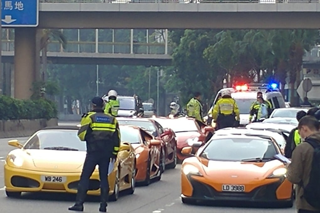 Officers intercepted 45 cars on Gloucester Road, Wan Chai, on Sunday morning. Photo: Facebook