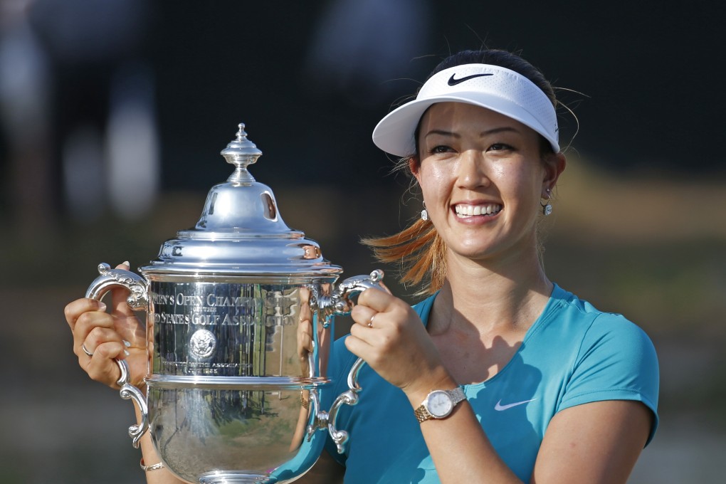 Michelle Wie poses with the trophy after winning the 2014 US Open. This was the same year Rudy Giuliani referenced in his story. Photo: AP