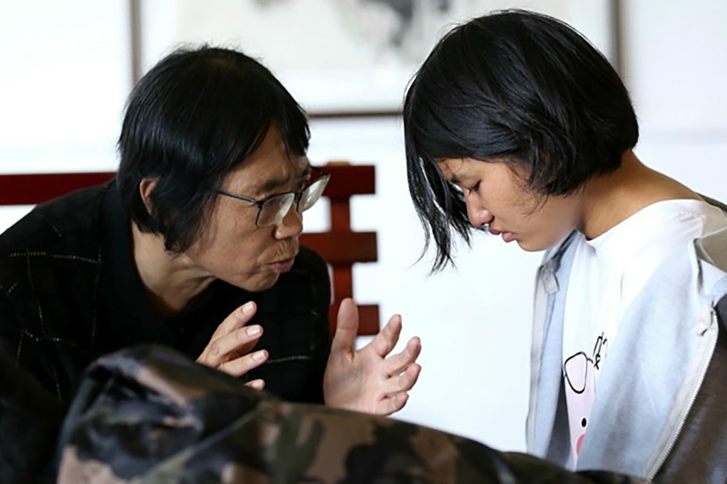 Zhang Guimei (left) with one of her students. Photo: Handout