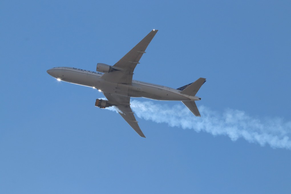 Smoke emanates from an engine fire on a Boeing 777 operated as United Airlines flight 328 on Saturday. Debris from the plane was scattered over Broomfield, Colorado. Photo: EPA/Hayden Smith @speedbird5280
