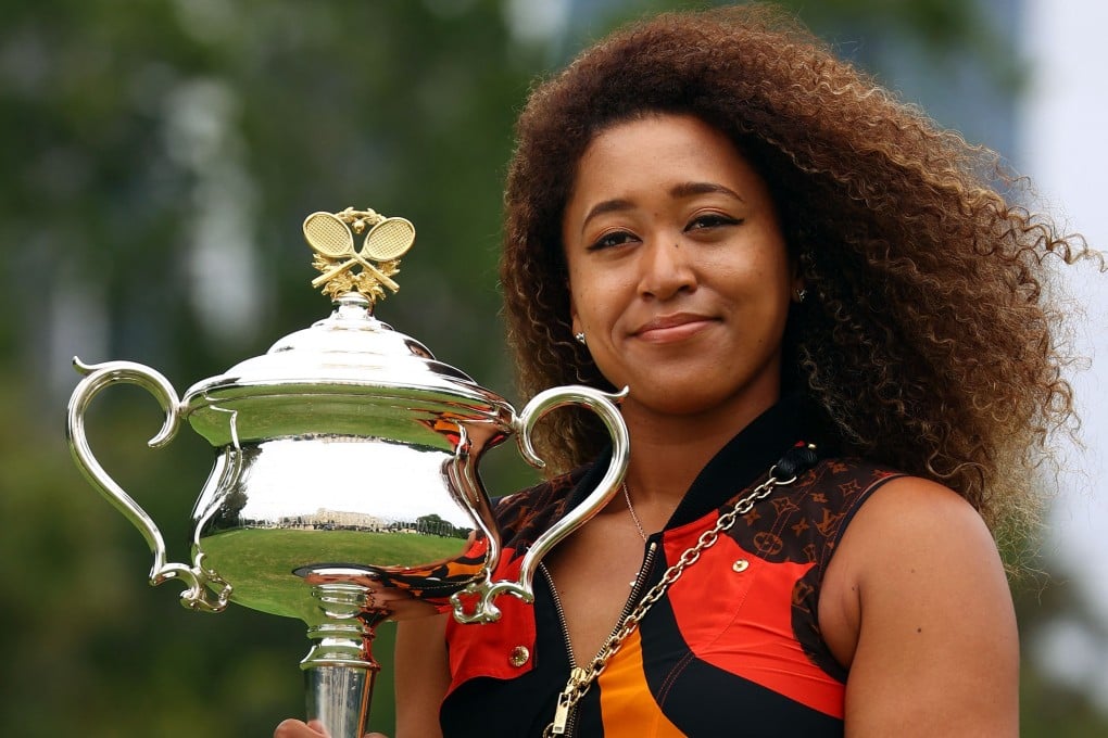 Naomi Osaka of Japan with the 2021 Australian Open trophy at Government House in Melbourne. Photo: AFP