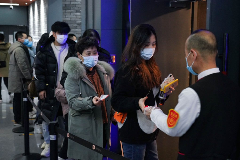 People queue to enter a cinema in Beijing on February 17, 2021. Photo: Xinhua