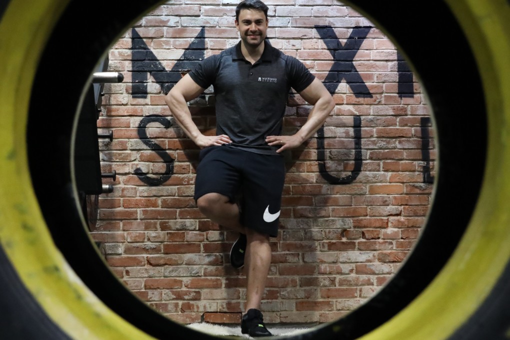 Jeff Basso, the director and a personal trainer at Maximus Studio, said go slow when getting back in shape to play your sport of choice. Photo: Nora Tam