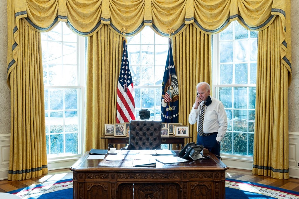 President Joe Biden talks on the phone in the Oval Office of the White House on January 22. The days of US allies giving Washington blank-cheque support are over. Photo: White House / Zuma Wire/ zumapress.com