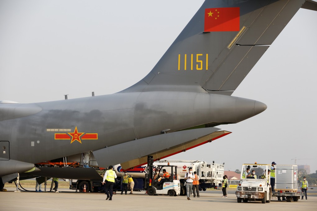 China shows up as a good neighbour in Cambodia as workers transfer the China-donated Sinopharm Covid-19 vaccines at Phnom Penh International Airport on February 7. Photo: Xinhua