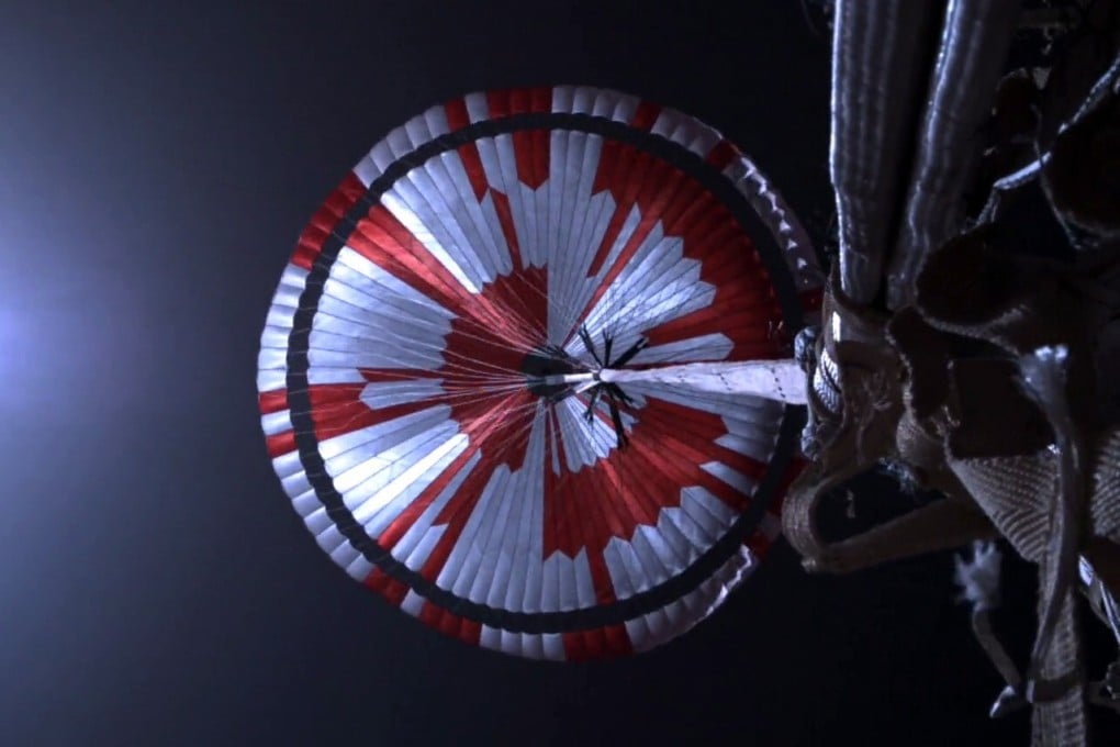 The Mars Perseverance rover’s parachute is deployed during the descent stage of the vehicle’s landing on the red planet on Thursday. Photo: EPA-EFE