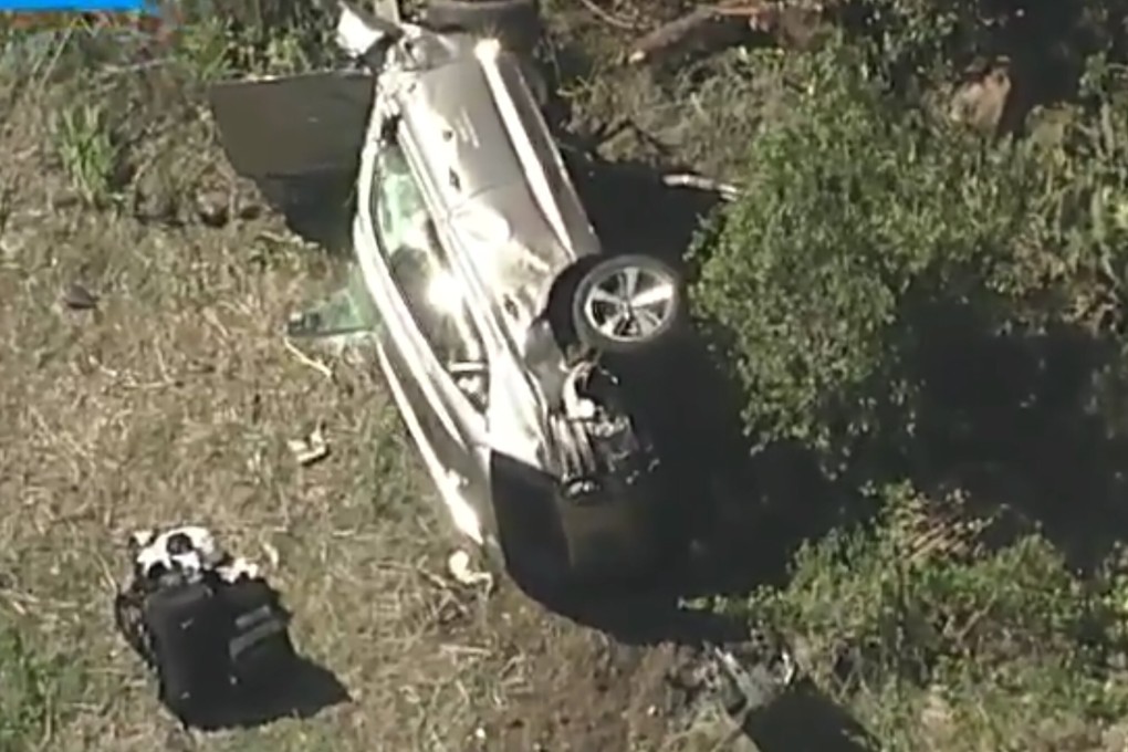 A vehicle rest on its side after a rollover accident involving golfer Tiger Woods in Los Angeles on Tuesday. Photo: KABC-TV via AP