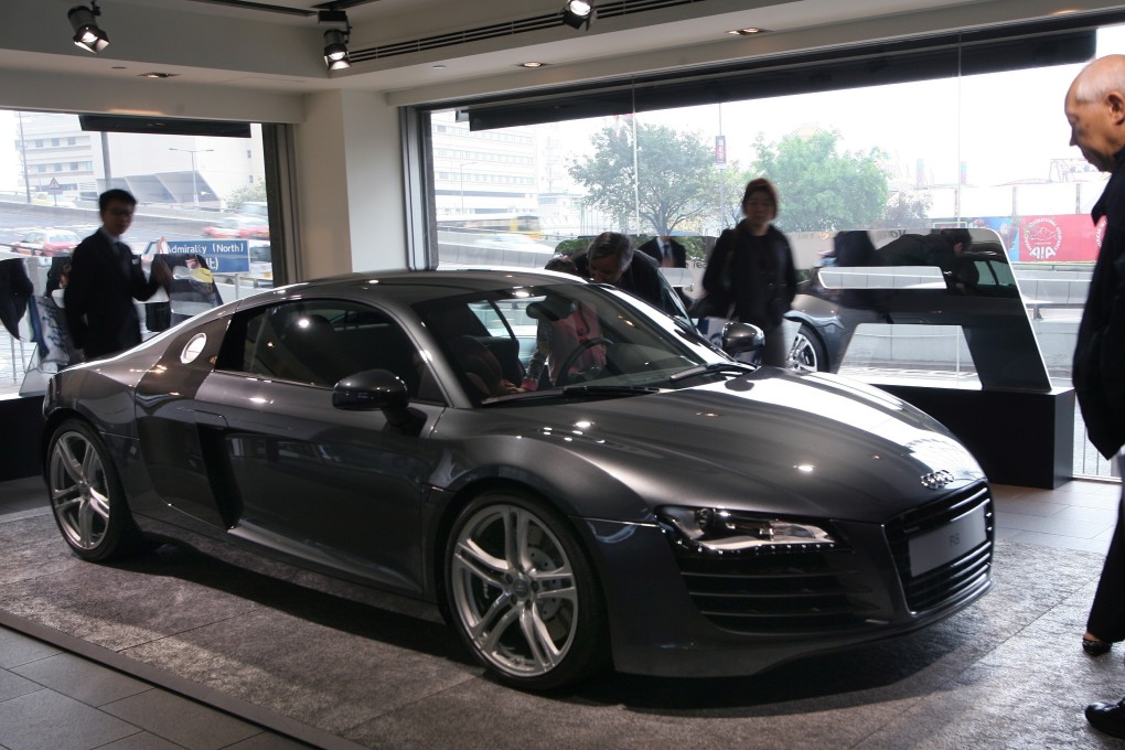 People visit an Audi showroom in Admiralty. Tax and licensing fees for private vehicles shot up on Wednesday. Photo: Dickson Lee