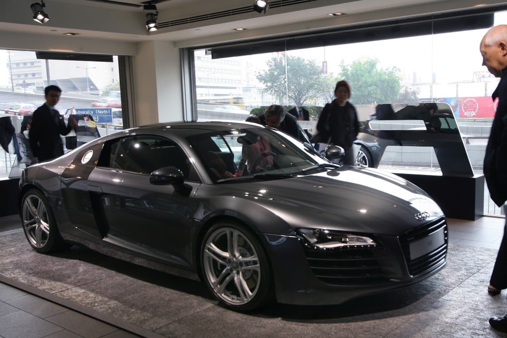 People visit an Audi showroom in Admiralty. Tax and licensing fees for private vehicles shot up on Wednesday. Photo: Dickson Lee