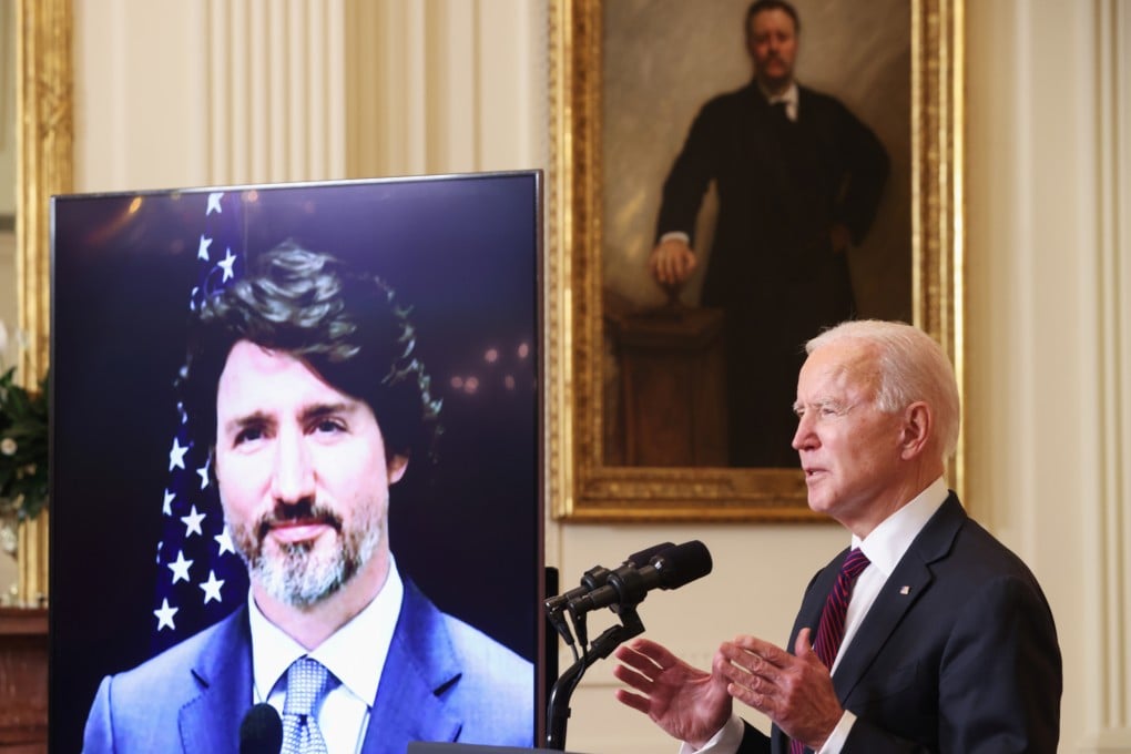 US President Joe Biden and Canadian Prime Minister Justin Trudeau hold their first bilateral meeting, by video link. Photo: Reuters