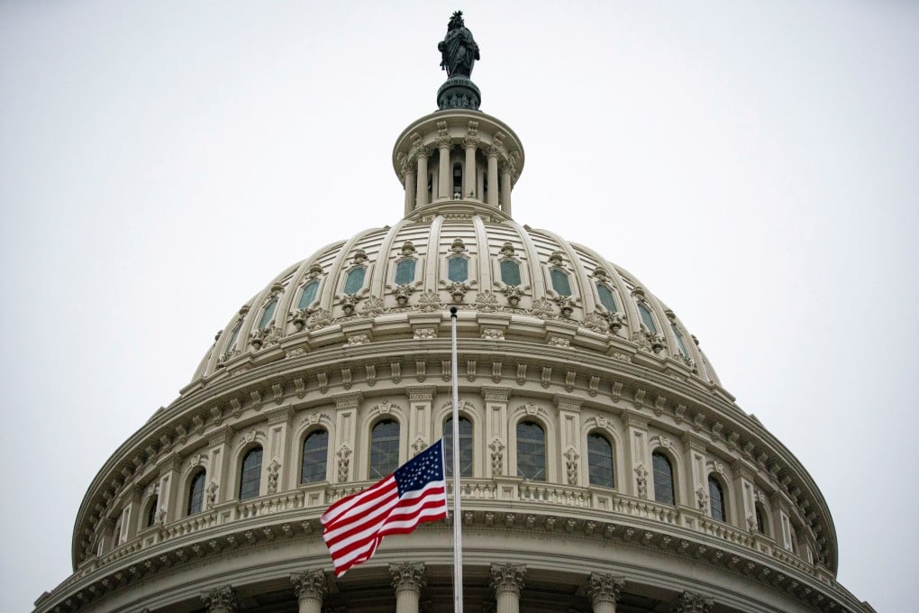 The American flag flies at half mast outside the US Capitol Building after the deadly attack on the building on January 6. Photo: Reuters