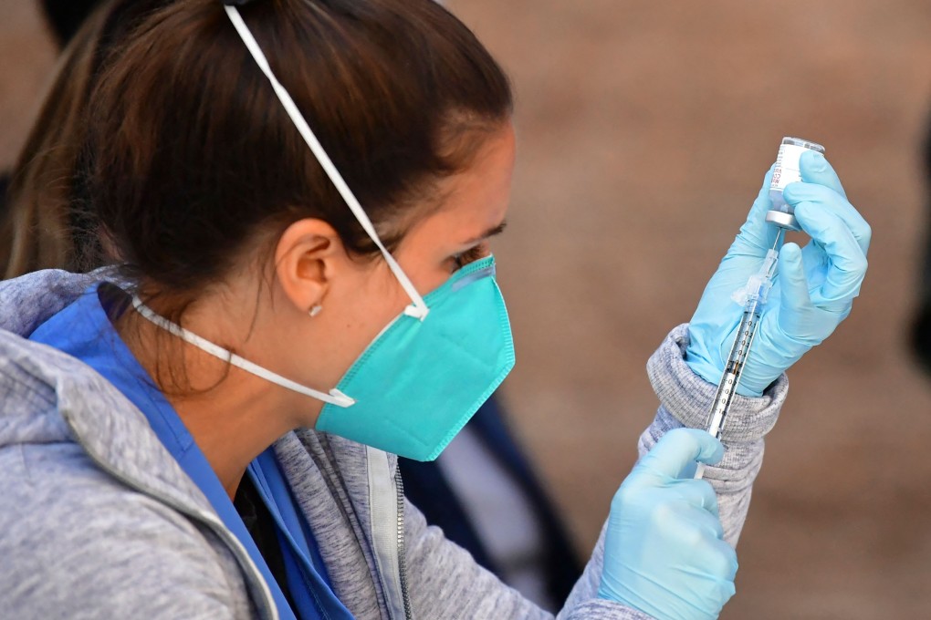 A nurse prepares a syringe with the Moderna Covid-19 vaccine in Los Angeles on Wednesday. Photo: AFP