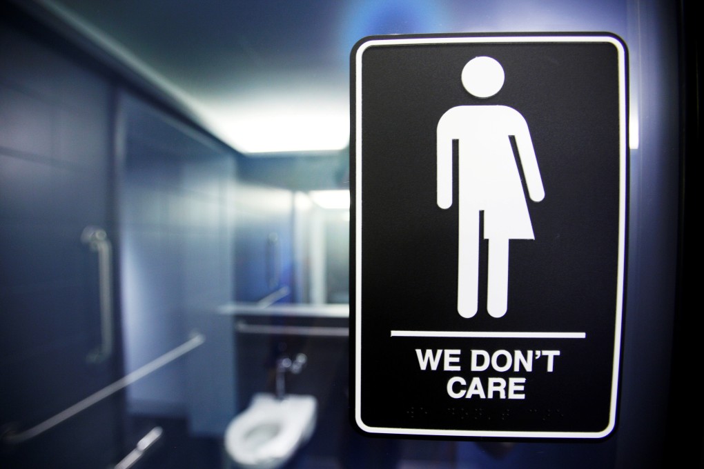 Signs for transgender bathroom access are becoming more common, at least in the West. Photo: Reuters