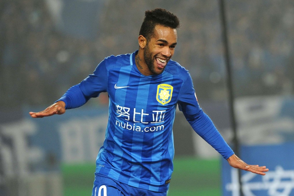 Jiangsu Suning's Alex Teixeira celebrates during the Chinese Super League in 2016. The striker is reported to have returned to China to naturalise for Li Tie’s national team. Photo: AFP