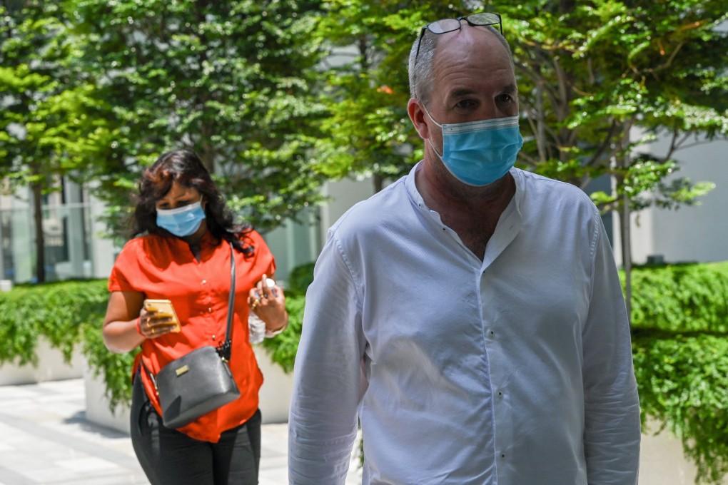 British national Nigel Skea and his wife arrive at the State Court in Singapore on Friday. Photo: AFP