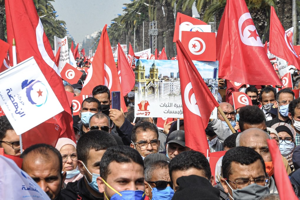 Supporters of the Islamic conservative Ennahda party take part in a demonstration to support the Tunisian government. Photo: Zuma Wire / DPA