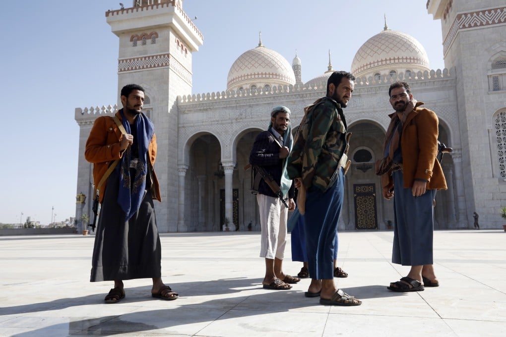 Armed Houthi fighters gather during a funeral procession for slain Houthi fighters in Sana’a, Yemen, on Sunday. Photo: EPA-EFE