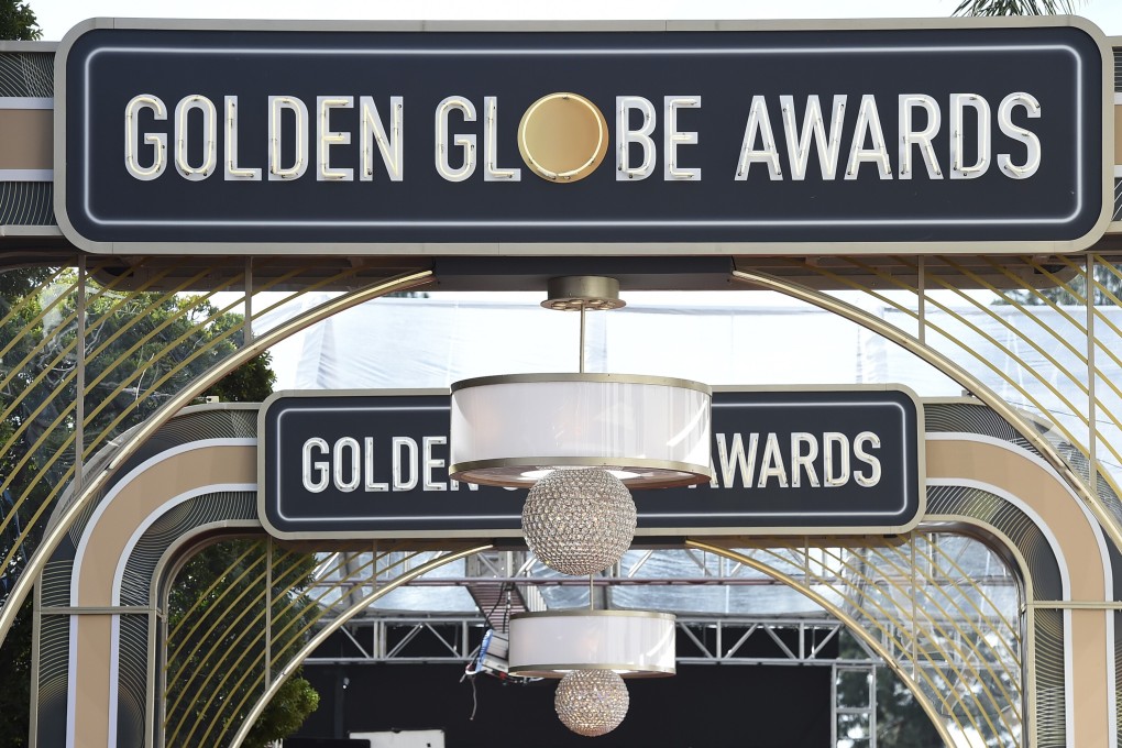 Event signage appears above the red carpet at the 77th annual Golden Globe Awards. Photo: AP