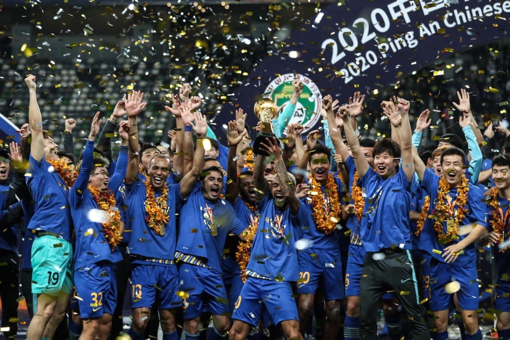 Jiangsu Suning players celebrate with the Chinese Super League trophy in November, 2020. The club has ceased operations, owners Suning said. Photo: Xinhua