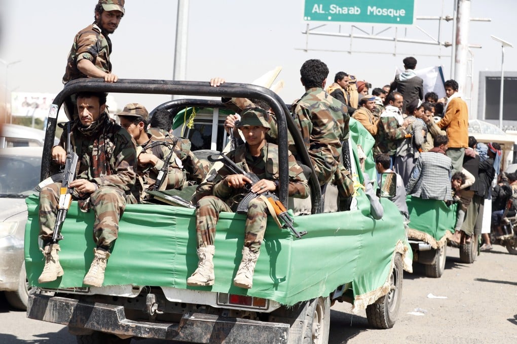 Houthi fighters ride on a truck in Sana’a, Yemen, earlier this month. Photo: EPA