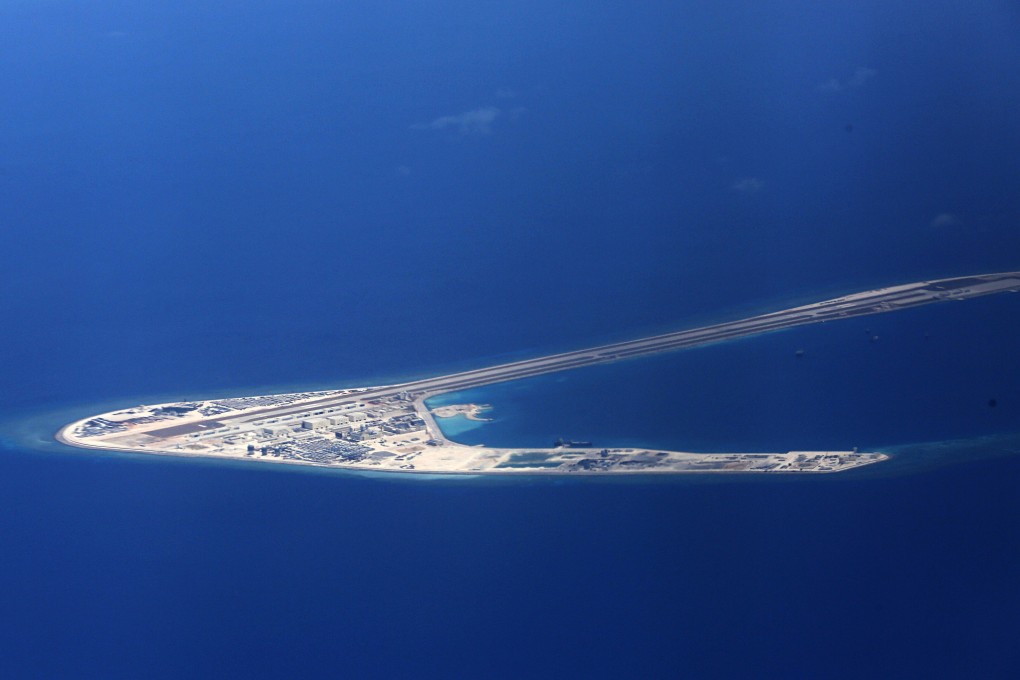 Chinese structures and an airstrip are seen on Subi Reef in the disputed Spratly Islands in the South China Sea. Beijing refused to accept a 2016 international tribunal ruling that rejected its territorial claims. Photo: AP