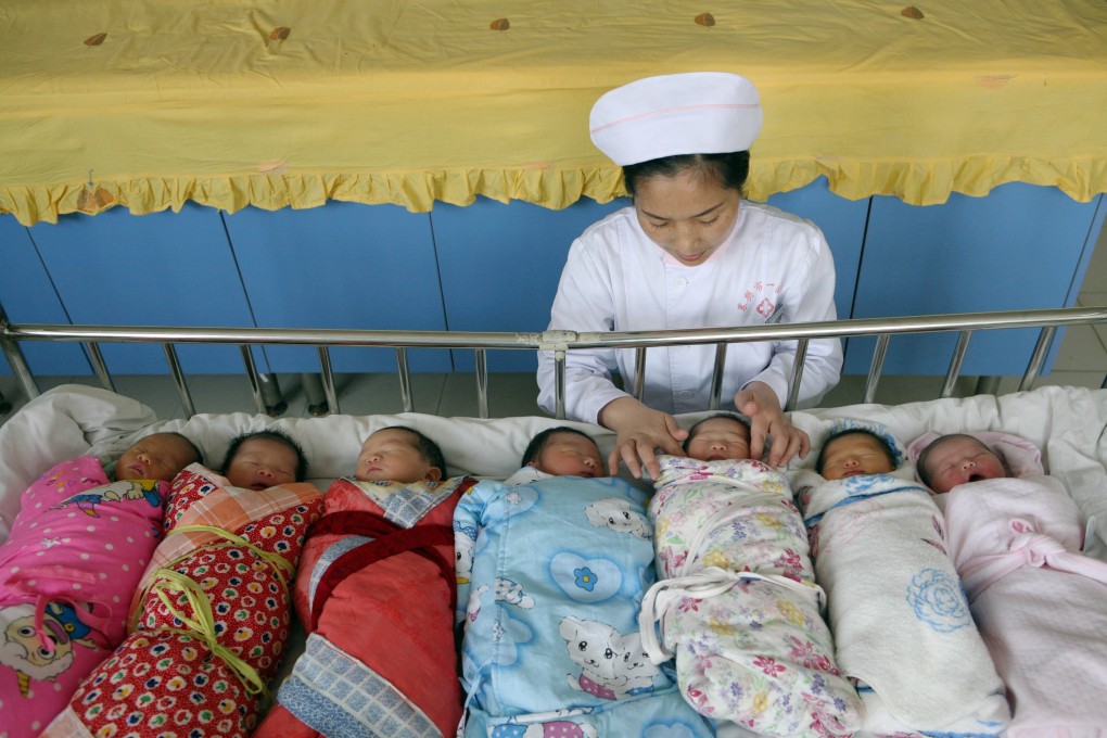 A nurse attends to a brood of newborn babies at Xiangfan People's Hospital in central China’s Hubei Province. Photo: Xinhua