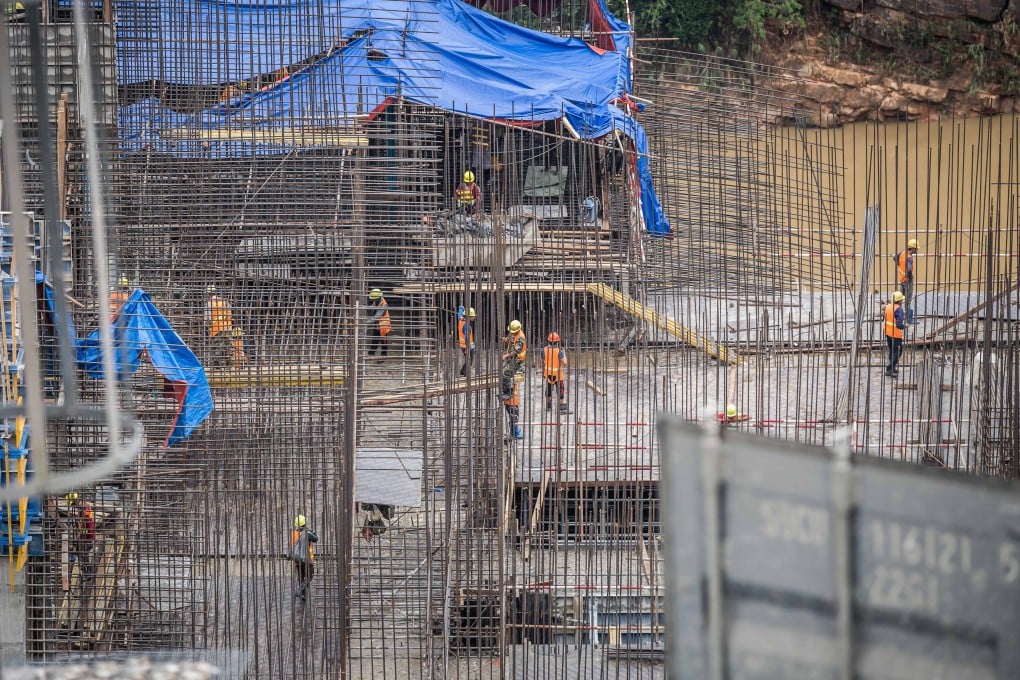 Workers on a construction site in Borikhamxay Province, Laos, August 19, 2020. Photo: Xinhua