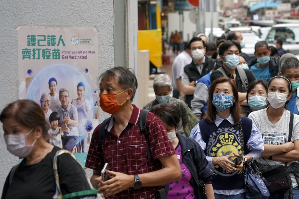 Members of the public queue for Covid-19 jabs in Jordan on the day of the vaccination campaign’s launch last week. Photo: Felix Wong