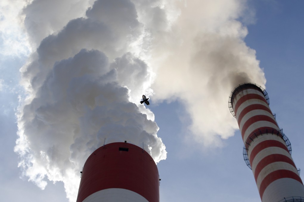 Smoke rises from the chimneys of a coal-fired power station. More than half of Vietnam’s energy needs are met by coal-fired power stations Photo: AP