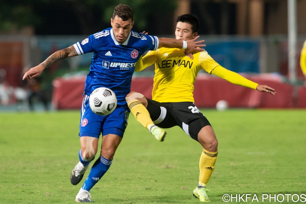 Everton Camargo of Eastern is challenged by Wong Ho-chun of Lee Man in the Hong Kong Premier League. The city could host an important regional football competition if a proposal to create a sporting bubble sees fruition. Photo: Hong Kong Football Association