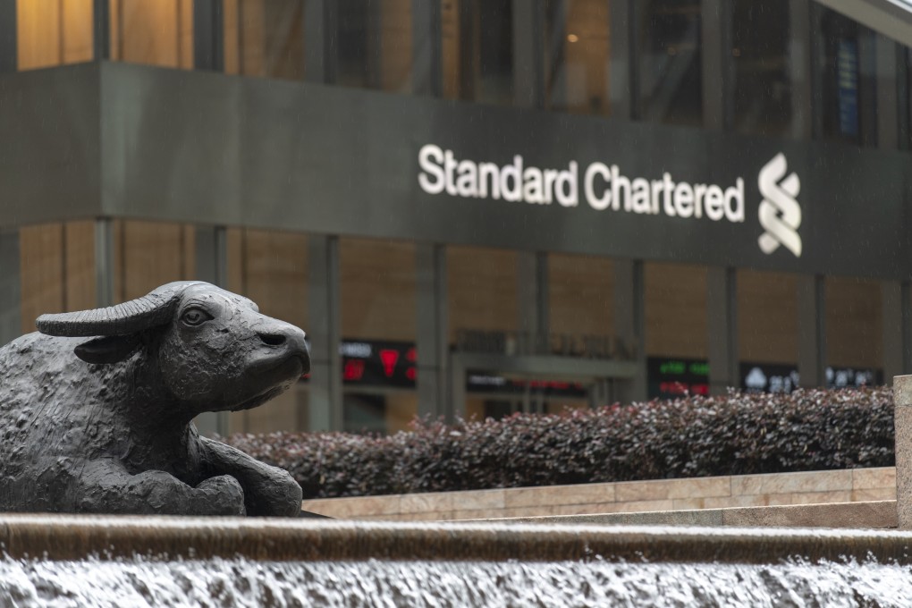 Standard Chartered has no plans to cut down its branch network of 70 in Hong Kong but will reduce space for back-office staff by 30 per cent. Photo: Warton Li