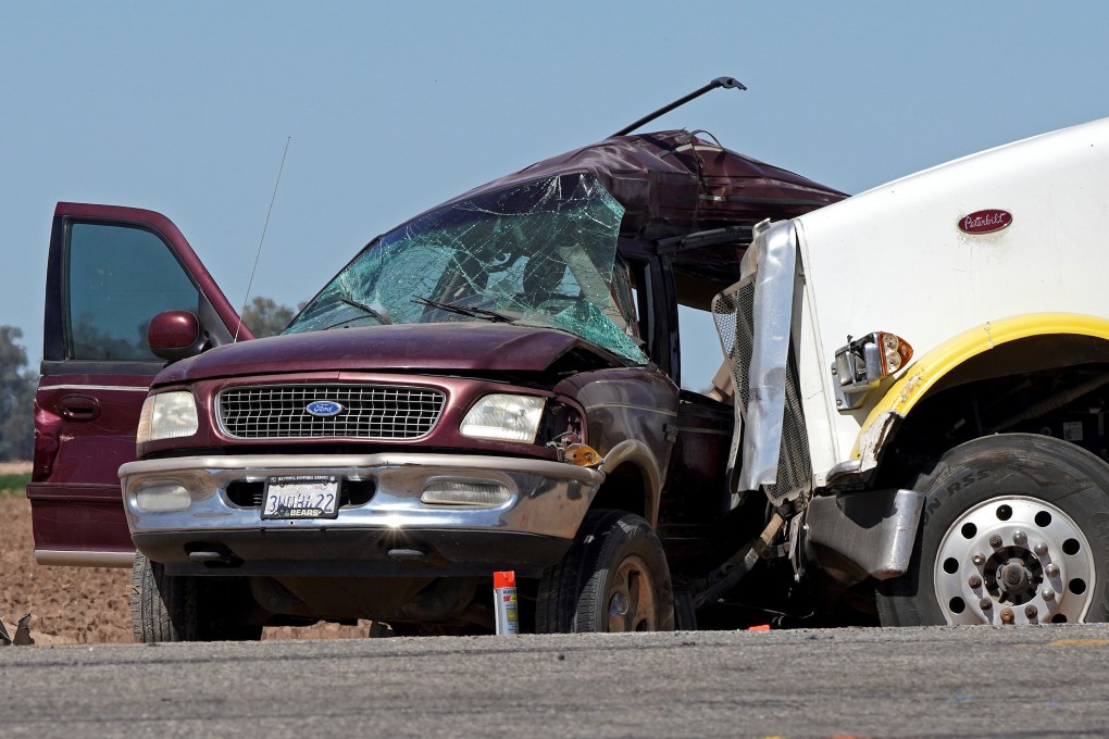 A maroon Ford Expedition, which had been crammed with adults and children, is seen after it was involved in a deadly collision with a truck near Holtville, California, on Tuesday. Photo: Reuters