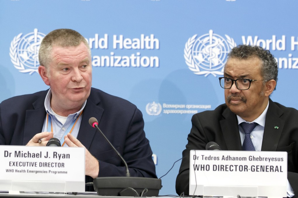 Michael Ryan, executive director of the WHO's Health Emergencies Programme, and Tedros Adhanom Ghebreyesus, director general of the World Health Organization. Ryan said it was ‘unrealistic’ to expect the pandemic might be stopped by the end of the year. Photo: AP