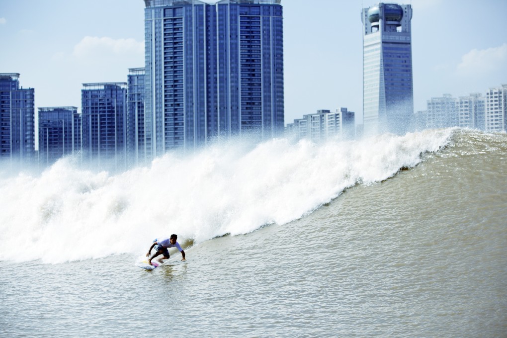 The Battle at the Silver Dragon with Hangzhou Tianyuan Tower in the background – the same site of surfing competitions today and 1,000 years ago. Photo: Surfing China _ Wabsono