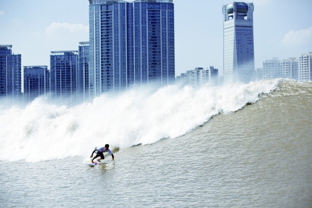 The Battle at the Silver Dragon with Hangzhou Tianyuan Tower in the background – the same site of surfing competitions today and 1,000 years ago. Photo: Surfing China _ Wabsono