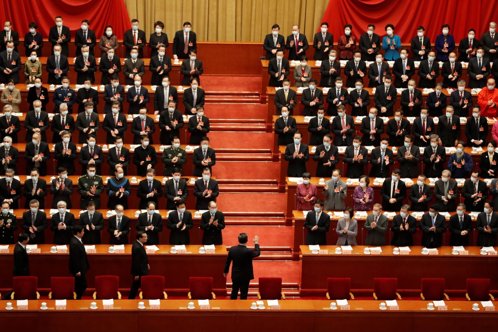 Chinese President Xi Jinping waves as he arrives for the opening session of the Chinese People's Political Consultative Conference at the Great Hall of the People in Beijing on Thursday. Photo: Reuters